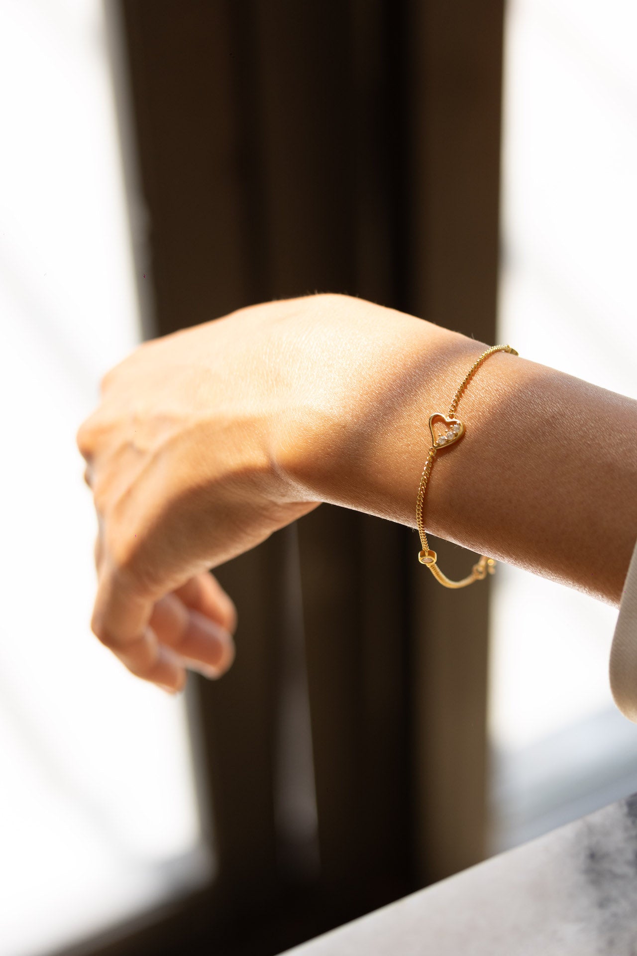 Pulsera corazón baño de oro 18 kilates corazón mujer zirconias cristales